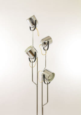 Chromed Reggiani floor lamp by Goffredo Reggiani zoomed in on the lamps