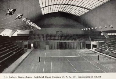 The K.B. Hallen with the PH Tennis lamps on both sides of the court
