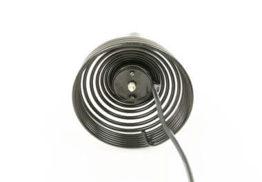 The bottom of a Spirale table lamp by Angelo Mangiarotti for Candle with the on/off switch