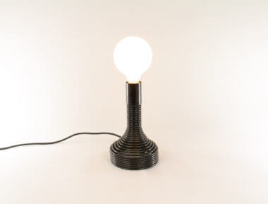 Spirale table lamp by Angelo Mangiarotti for Candle switched on