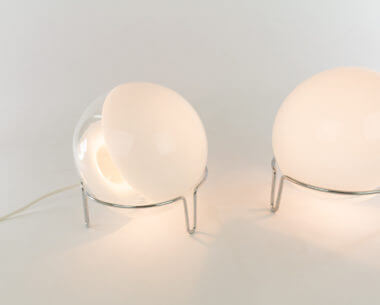 A sfera table lamp by Angelo Mangiarotti for Skipper, switched on