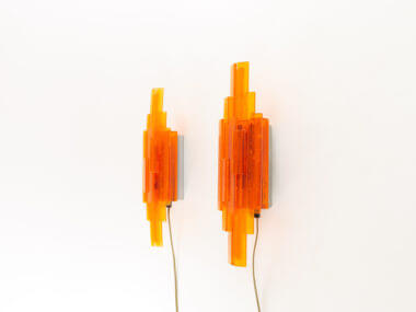 Orange wall lamps by Claus Bolby for Cebo industri as seen from one side
