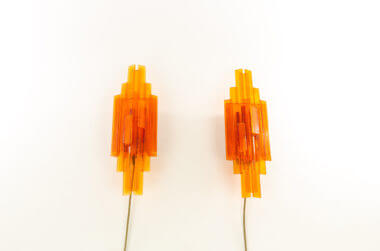 Orange wall lamps by Claus Bolby for Cebo industry as seen from below