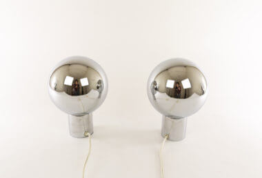 The back of two of chrome Eclisse table lamps attributed to Reggiani