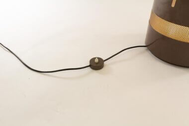 The On / Off Switch of a Mezzoracolo floor or table lamp by Gae Aulenti for Artemide