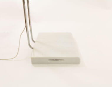 The marble base of a white Gesto floor lamp by Bruno Gecchelin for Skipper