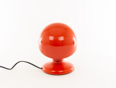 Red Jucker table lamp by Tobia Scarpa for Flos as seen from the back
