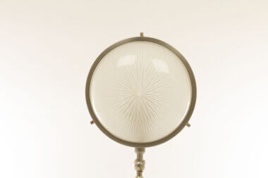 The glass semi globe of a Gamma wall lamp by Sergio Mazza for Artemide