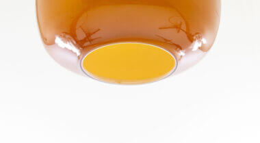 The chip on the amber glass pendant by Massimo Vignelli for Venini