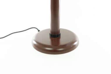 The base of a brown table lamp by Gae Aulenti for Stilnovo