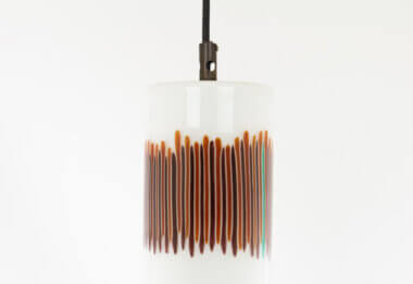 The red stripes on a white and Red glass pendant by Massimo Vignelli for Venini