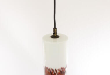 The top part of one of the two White and Red glass pendants by Massimo Vignelli for Venini