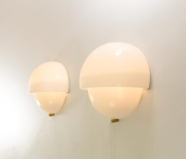 Mania wall lamps by Vico Magistretti for Artemide, switched on