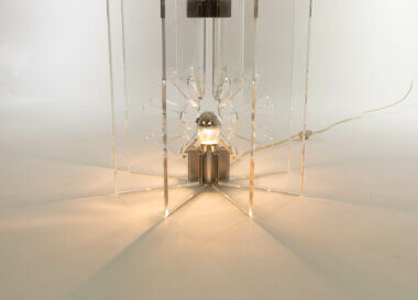 The lightbulb of a Model 524 Table lamp by Franco Albini and Franca Helg for Arteluce
