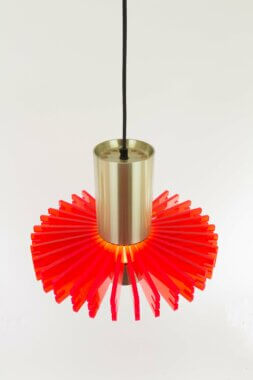 A red Priest collar pendant by Claus Bolby for Cebo Industri as seen from above