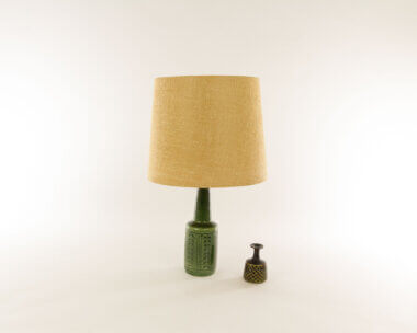 A Moss green DL/21 table lamp by Linnemann-Schmidt for Palshus with a small vase