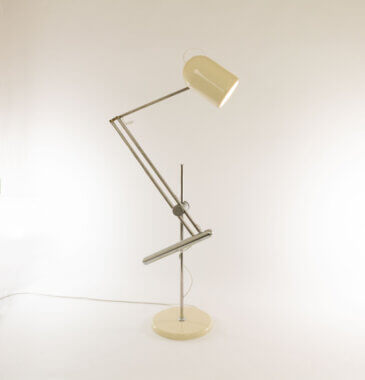 Table lamp Model G32 designed and manufactured by Reggiani switched on