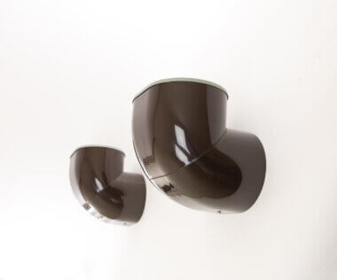 Pair of brown Gomito Wall Lamps by Gae Aulenti for Stilnovo, from one side