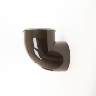 The wonderful shape of a brown Gomito Wall Lamp by Gae Aulenti for Stilnovo