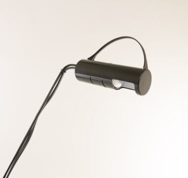 The reflector of a black Slalom table lamp by Vico Magistretti for O-Luce