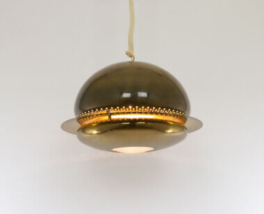 Brass Pendant Nictea by Tobia and Afra Scarpa for Flos, switched on