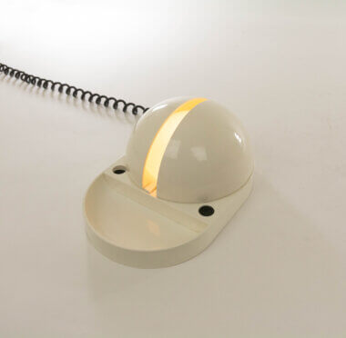 Tapira desk lamp designed by GPA Monti for Fontana Arte, completely closed but sill switched on