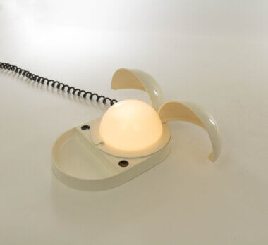 Tapira desk lamp designed by Gianemilio Piero and Anna Monti for Fontana Arte, switched on