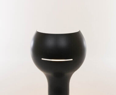 The top of a Black Flash table lamp model by Joe Colombo for O-Luce