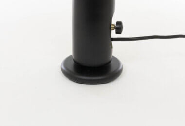 The base of a Black Flash table lamp model by Joe Colombo for O-Luce