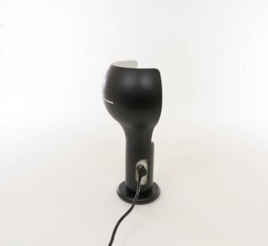 Black Flash Table lamp model by Joe Colombo for O-Luce, seen from the other side