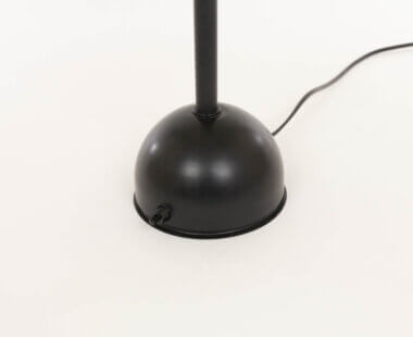 The base of a Black Stringa table lamp by Hans Ansems for Luxo Italiana