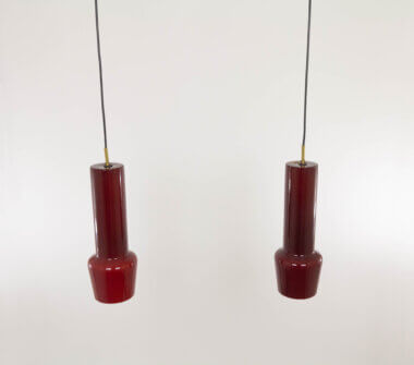 Pair of red glass pendants by Massimo Vignelli for Venini, as seen from above