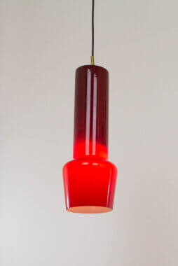 Red glass pendant by Massimo Vignelli for Venini, switched on