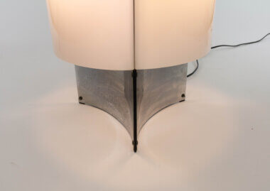 The metal bottom of a Model 526 Table lamp by Massimo Vignelli for Arteluce