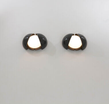 Pair of grey Lampira wall lamps by G.P.A. Monti for Fontana Arte, switched on