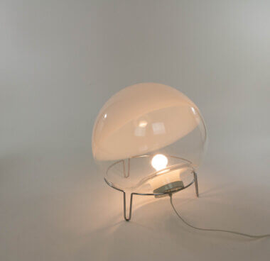 The back of a Sfera Table of Floor Lamp by Angelo Mangiarotti in Murano Glass for Skipper, now switched on
