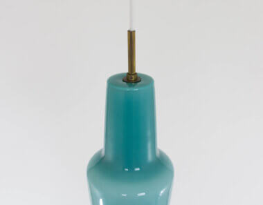 The brass part of a Turquoise pendant by Massimo Vignelli for Venini