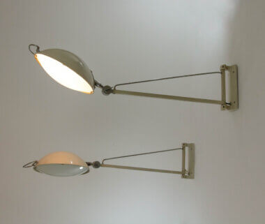 A pair of beautiful hospital wall lamps, model 2130, by Stilnovo, switched on