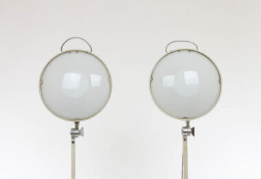 The glass parts of a pair of hospital wall lamps, model 2130, by Stilnovo