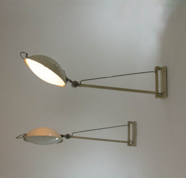 Pair of model 2130 wall lamps by Stilnovo, one switched on the other one not