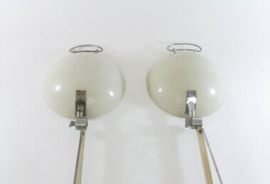 The attachment points of a pair of hospital wall lamps, model 2130, by Stilnovo