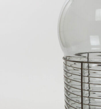 The glass and metal parts of a Alcinoo table lamp by Gae Aulenti for Artemide
