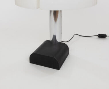 The black base of a Spicchio table lamp by Corrado and Danilo Aroldi for Stilnovo