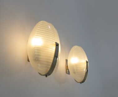 Pair of Lambda wall lamps in metal and glass by Vico Magistretti for Artemide, as seen from one side