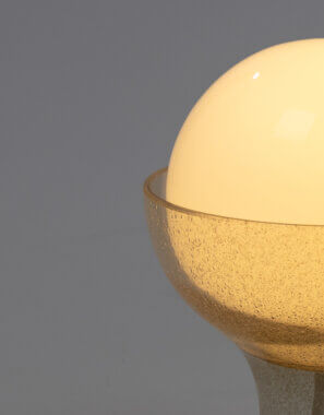 One side of a LT 215 Table Lamp for A.V. Mazzega by Carlo Nason
