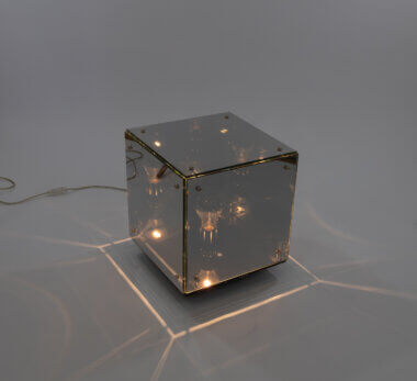 Prismar table lamp by Studio A.R.D.I.T.I. for Nucleo Sormani, switched on