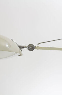 A closer view on a detail on a Model 2130 wall lamp by Stilnovo, used in hospitals