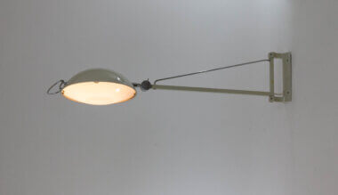 Beautiful Model 2130 wall lamp by Stilnovo, used in hospitals, switched on